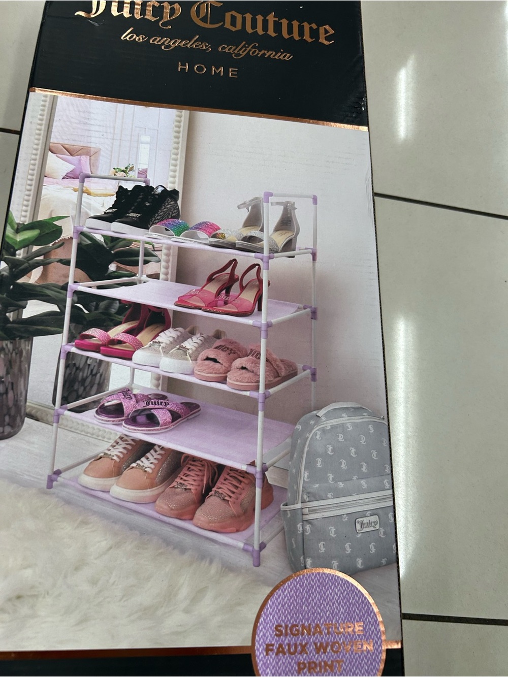 Juicy couture shoe rack that  holds 15 pairs of shoes